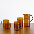 KINTO Cast Amber Glass 350ml in a table setting